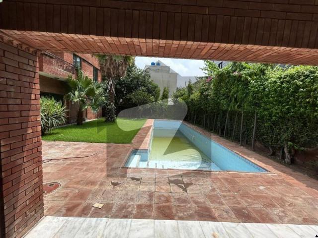 2 kanal elegant and fully maintained super hot located bungalow is available in the best block of dha lahore | 3 servant quarters dha phase 1 block a