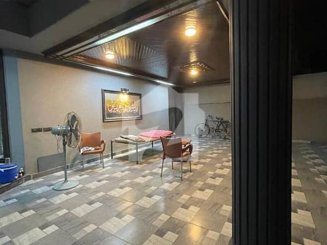 2 kanal elegant and fully maintained super hot located renovated & fully furnished bungalow is available in the best block of dha phase 2 lahore