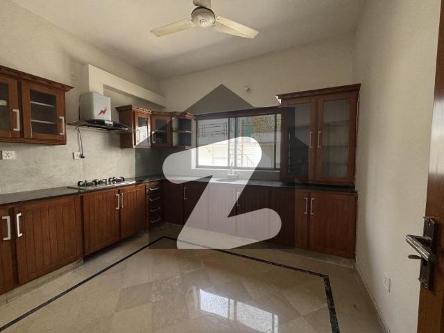 Brand new house beautiful green lawn top location close end street tiled flooring excellent washrooms and kitchen f 10