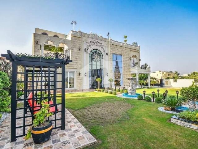 2 kanal luxurious spanish design house full furnished with 1 kanal lawn