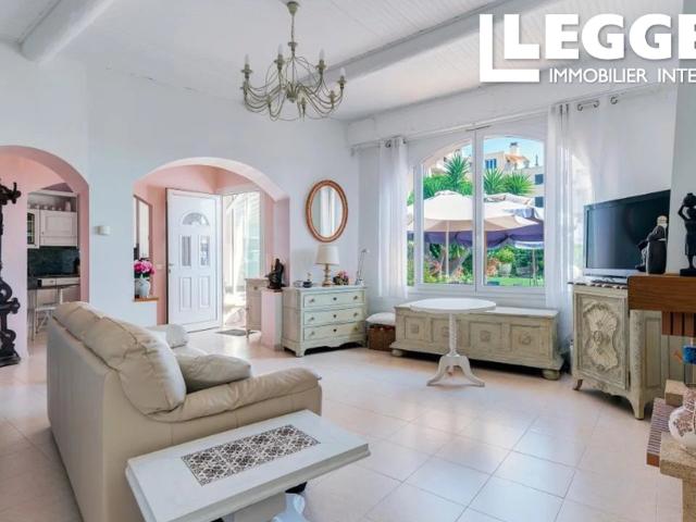 2 pièces 91m² sur jardin arboré 420m². 1 chambre et SdB. Cave 55m² et garage