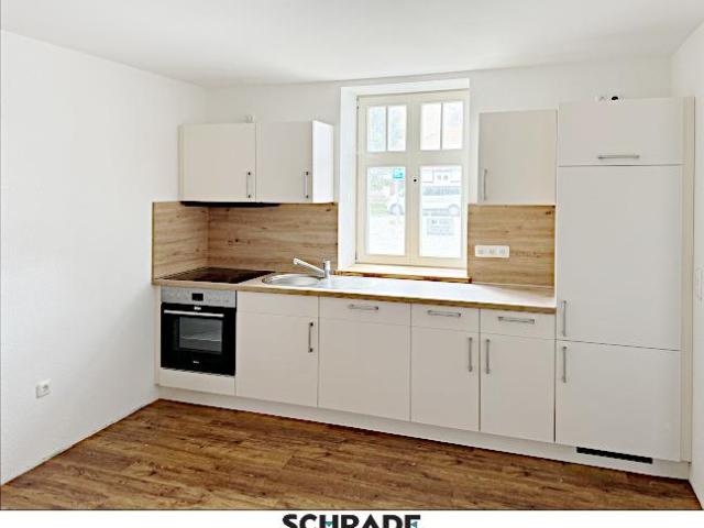 2 Raum Wohnung im Erdgeschoss und mit Einbauküche im Herzen der Stadt