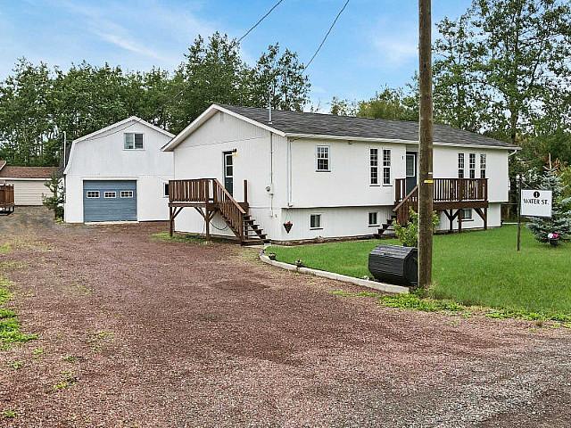 2 Unit Home That Has A Beautiful Ocean View & Large Garage