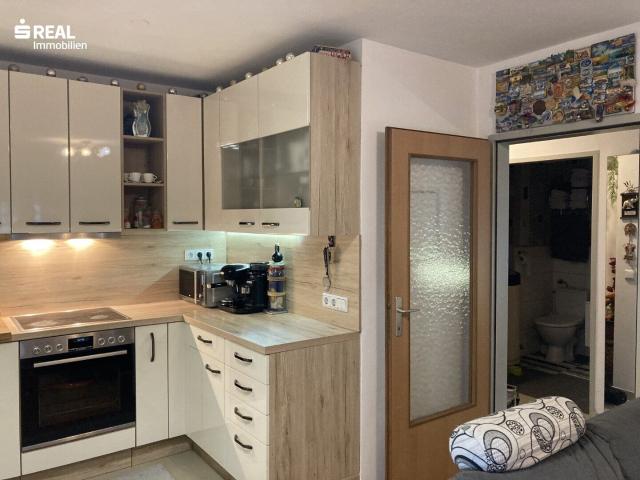 2 Zimmer Wohnung: verkehrsberuhigte Lage, Südbalkon, Tiefgaragenstellplatz