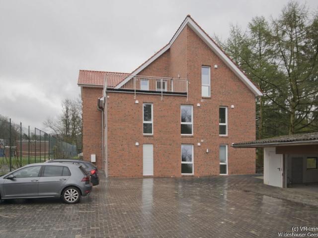 2 Zimmer Dachgeschosswohnung mit Dachterrasse und Carport