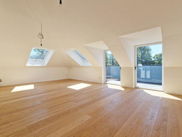 2 Zimmer Dachgeschosswohnung mit Südwest Balkon und Carportstellplatz