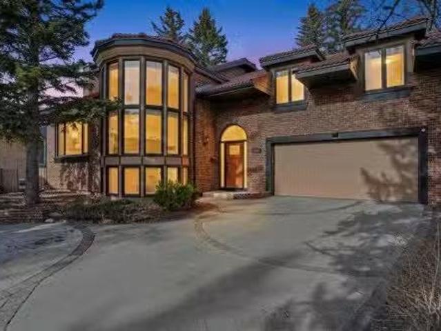 311 Coach Light Bay Sw, Calgary, AB, T3H 1X3 house for sale.