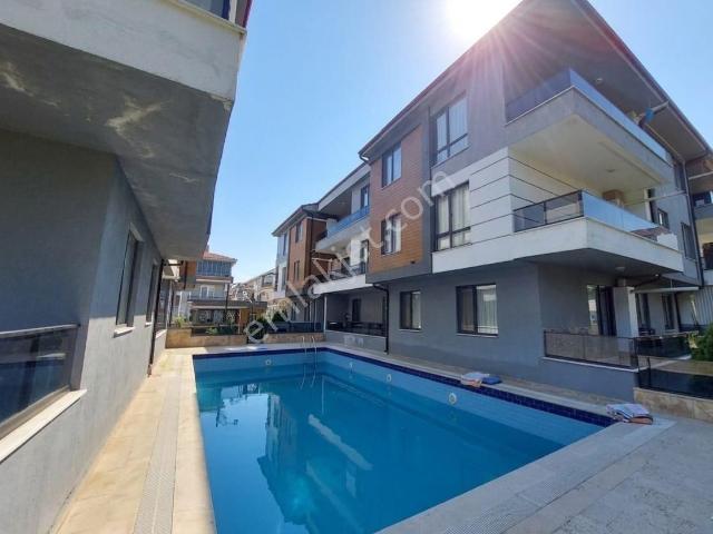 32 Evlerde Full Sıfır Eşyalı Butik Havuzlu Sitede 2+1 Satılık