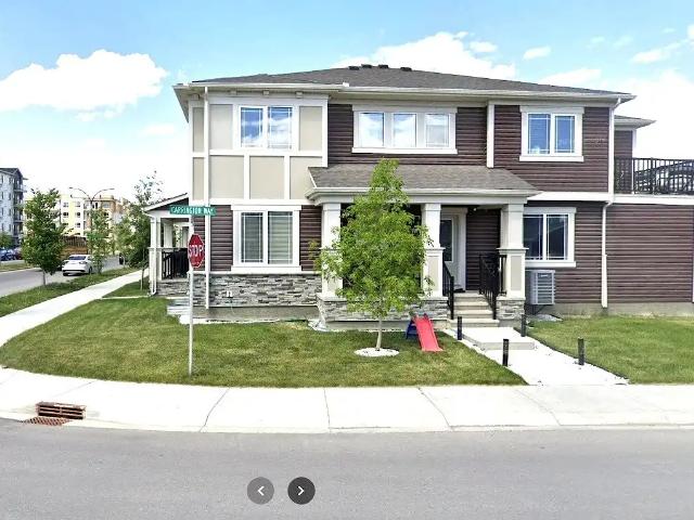 3 Bed + Bonus Room, 2 Car Garage End Unit Townhouse