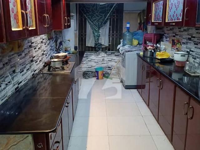 3 Bed DD Corner West Open Apartment For Sale In Johar Block 16 | 1500 Sq. Ft. Leased | Boundary Wall Project | Prime Location Near Aladin & Main Road