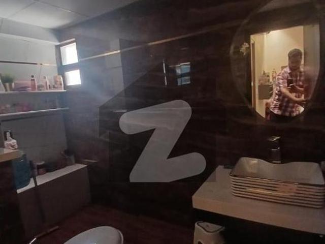 3 bed DD in high rise project with All modern amenities including swimming pool gym and play area Shahra e Faisal