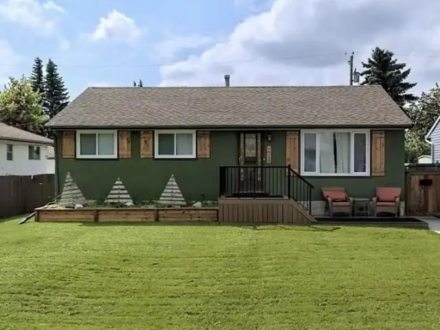 3 Bedroom 1 Bath A/C insuite laundry, garage parking