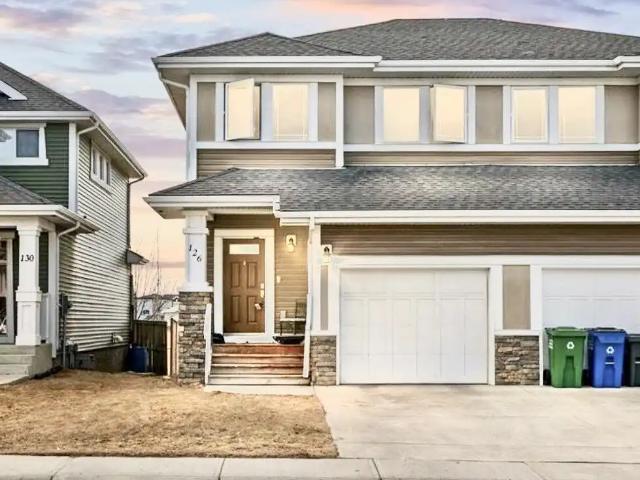 3 Bedroom Duplex with Fenced Yard Backing onto a School