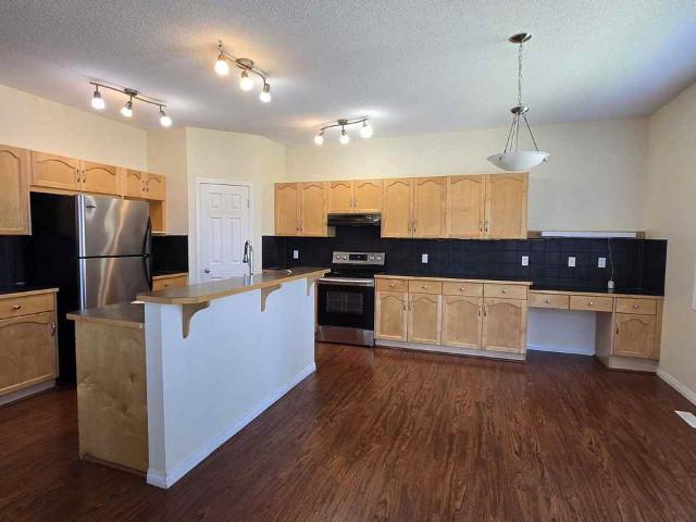 3 Bedroom Home for Rent at 436 Cimarron Blvd, Okotoks, AB T1S 0J4