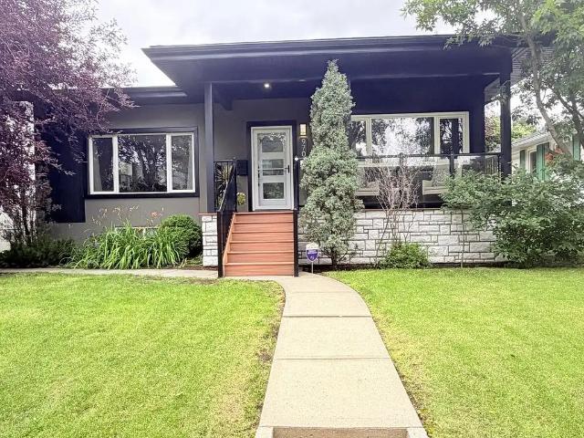 3 Bedroom Main Floor in Holyrood | 9 Ft Ceilings + Private Yard + Garage + A/C