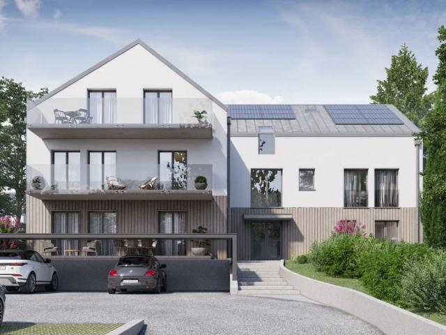 3 bis 6,5 Zimmer Doppelhaus mit zwei Balkonen und Blick auf die Alpen