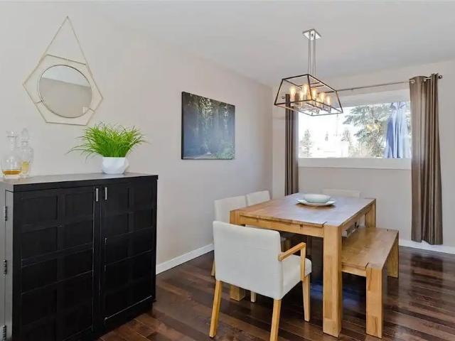 3 level split on large pie lot. Rich hardwood flooring with granite counter tops