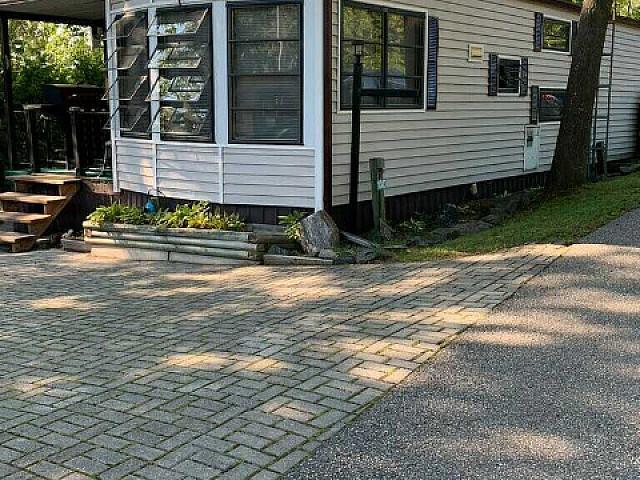 3 Season Trailer Home Nestled In A Small Community