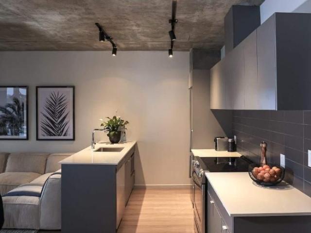 3 1/2 dans un projet locatif moderne à Place Gare Viger