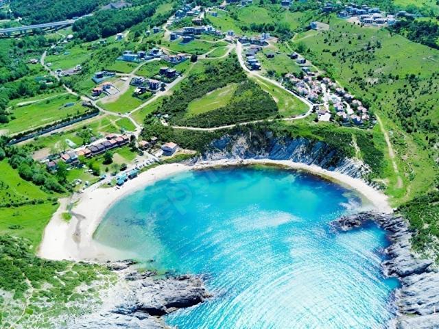 3K GYM 640 m SAHİL KORİDORUNDA DENİZ VE KOY MANZARALI ARSA