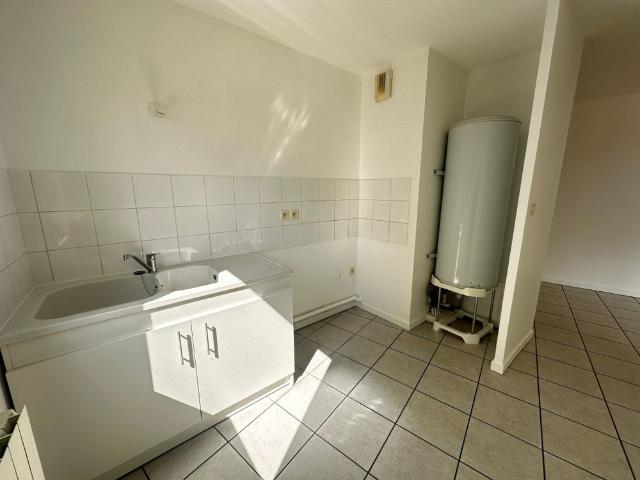 T3 avec balcon et garage Adresse centrale et cadre.