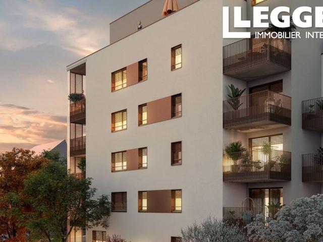 T3 neuf de 60m2 a vendre a Lyon 8ème. Situé au RdC avec un balcon et parking en sol