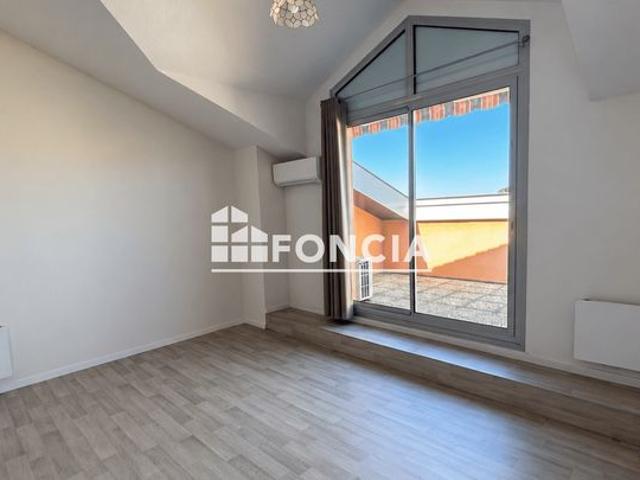T1 Bis avec terrasse, parking, ascenseur