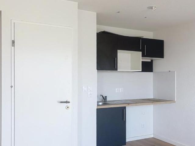 T1 BIS NEUF BALCON PARKING SOUS SOL CENTRE DE VILLAGE