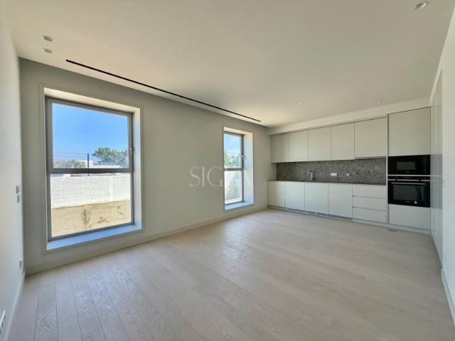 T1 em Primeira Linha de Mar