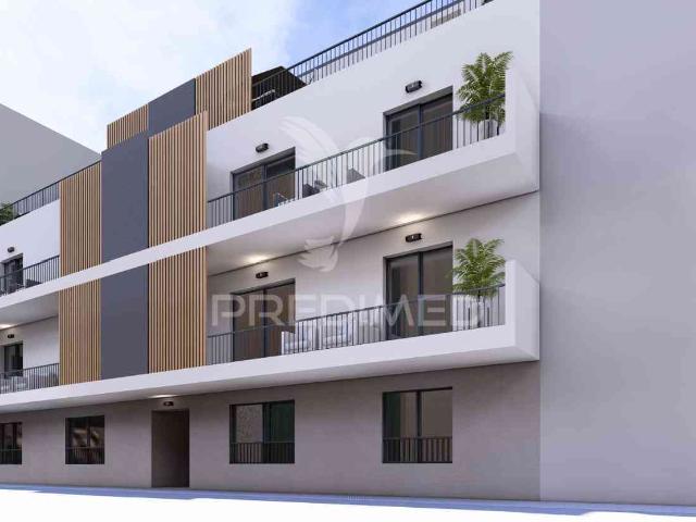 T1 num r/c de um edifício em construção, central fracção B