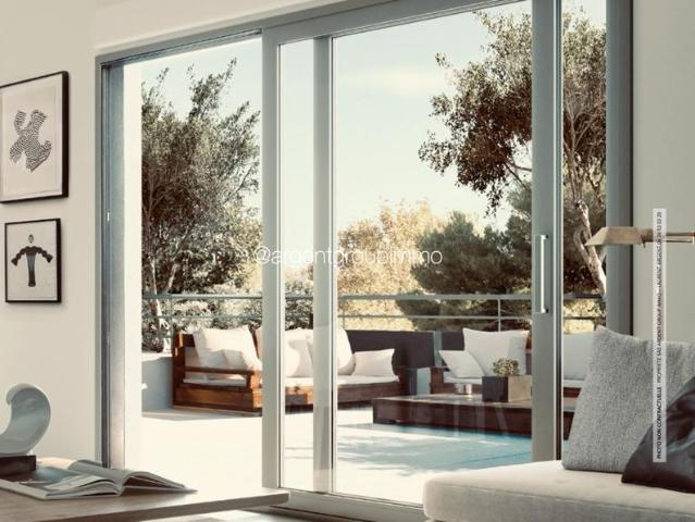 T2 avec terrasse, cave et garages