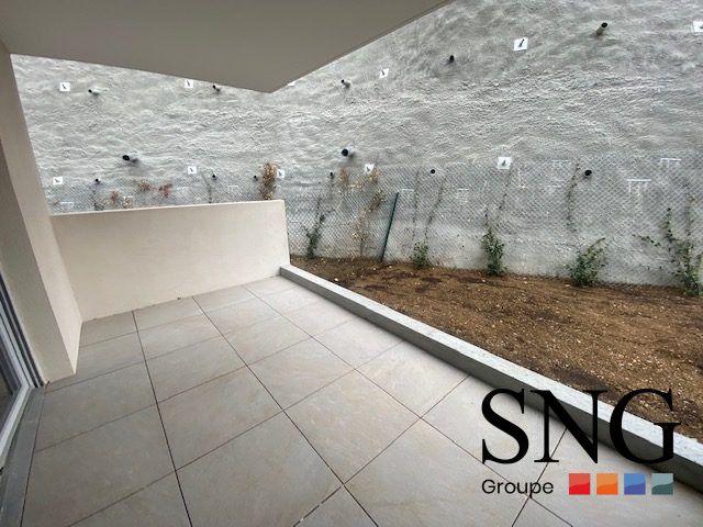 T2 AVEC TERRASSE / JARDIN ET PARKING DOUBLE