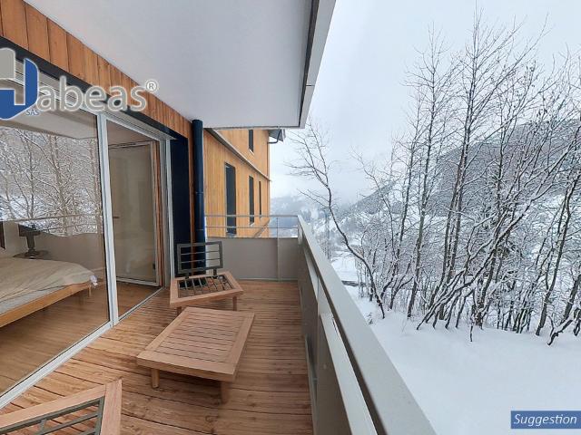 T2 avec 1 chambre et un Balcon de 16.31m², Un Casier à Ski, et un cellier