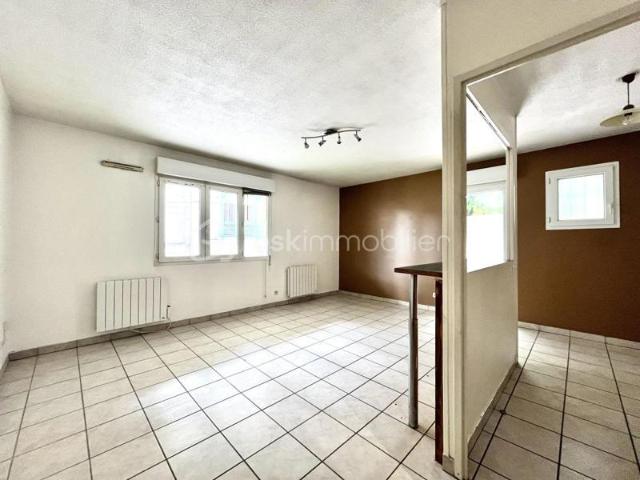 T2 de 46 m² avec grande terrasse, parking privatif et cave