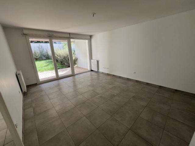 T2 en rez de jardin Quartier des Arènes