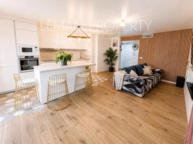 T4 en rez de jardin de 80 m2 avec en SUS garage double