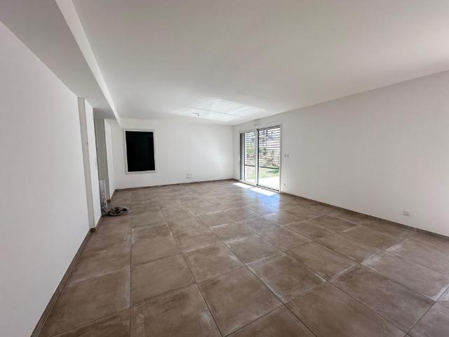 T4 NEUF MEUBLE EN REZ DE JARDIN A GLEIZE AVEC GRAND.