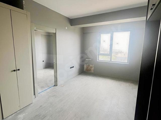 TAŞPINAR'DA BULVARA YÜRÜME MESAFESİNDE 1+1 DAİRE