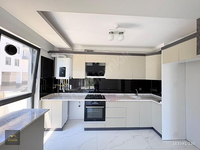 TAŞPINAR'DA 2+1 70 m BÜYÜK BALKONLU ARA KAT FERAH DAİRE