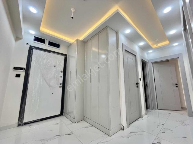 Taylan Emlaktan Migros Yanı Sıfır 2+1 Geniş Balkon Full Yapılı