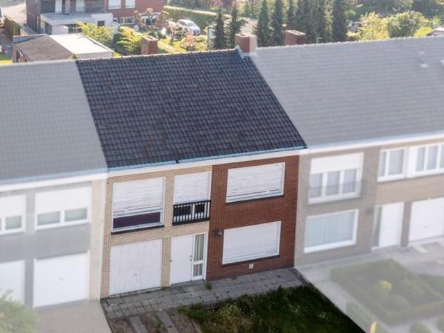 Te renoveren gezinswoning met 4 slaapkamers in het centrum