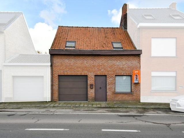 'Te renoveren woning met garage en tuin'