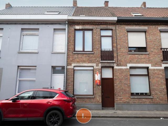 Te renoveren woning te koop in centrum Menen