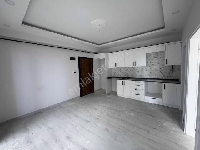 Tema Emlaktan Gündoğdumah Sıfır Denizmanzaralı 1+1 Satılık Daire