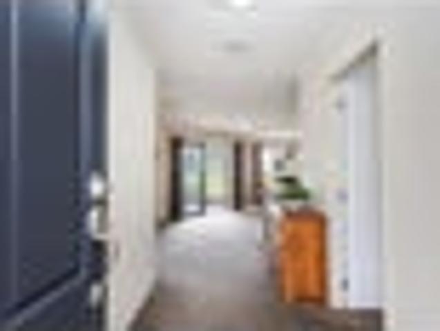 TEAM LEWIS 4 BED HOME WITH TRIPLE IA GARAGE