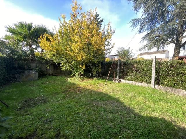 Terrain à bâtir avec garage existant