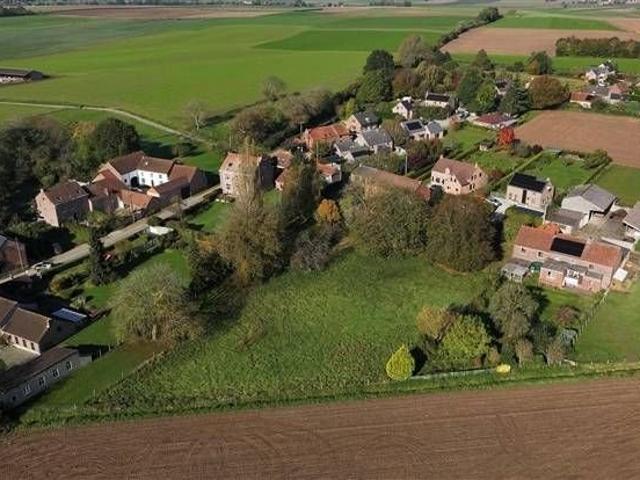 Terrain à bâtir exposé plein Sud avec vue sur champs