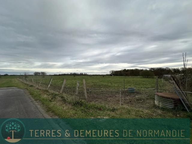Terrain à lotir non viabilisé de 900 m² sur la commune de PETIT