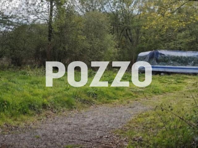 Terrain de loisir de plus de 4 400 m2 avec caravane, dalle béton et mare