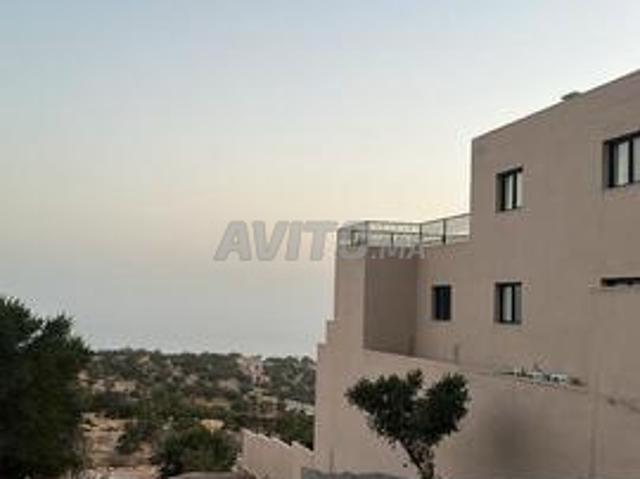 Terrain de 750 m2 à Aït Bihi avec vue sur mer à vendre